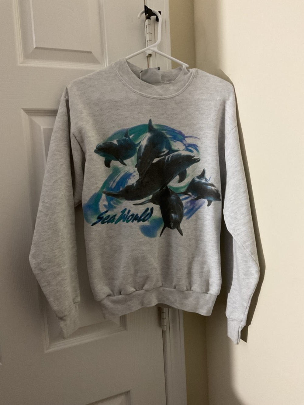 Lee Gray Crewneck Sweatshirt with Blue Dolphin Graphic